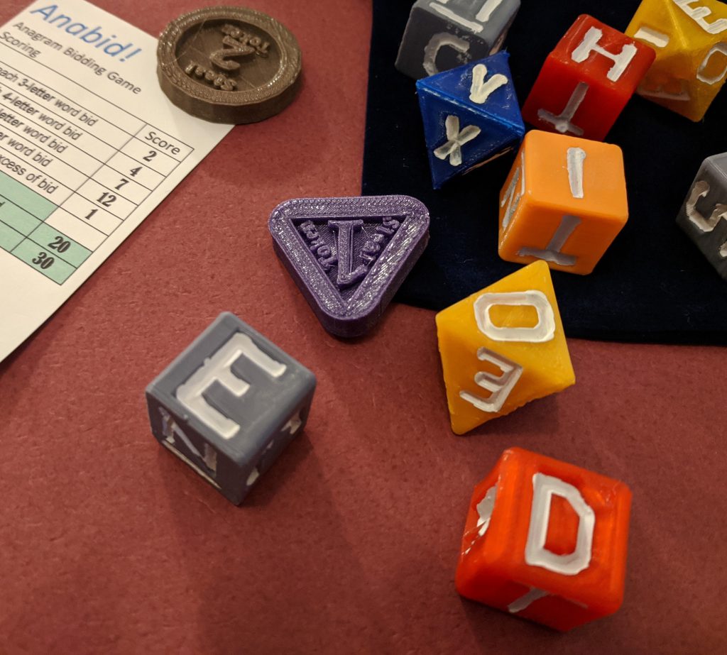 Multi-colored Anabid! dice with scoring reminder & steal tokens